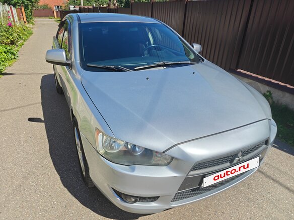 2008 Mitsubishi Lancer X, серебристый - вид 1