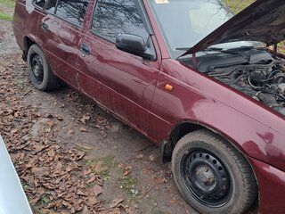 2010 Daewoo Nexia I Рестайлинг, красный, 170000 рублей, вид 4
