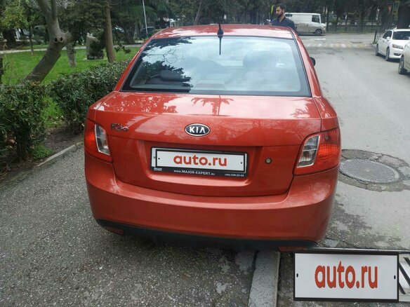 2010 Kia Rio II Рестайлинг, красный - вид 2