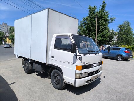 1991 Isuzu Elf (N-series), белый, 465000 рублей, вид 1