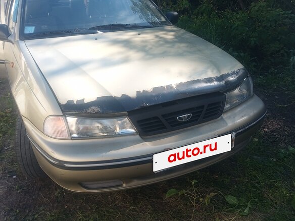 2004 Daewoo Nexia I, золотистый, 99000 рублей - вид 1