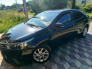 2013 Toyota Corolla XI (E160, E170, E180), чёрный, 1599000 рублей, вид 3