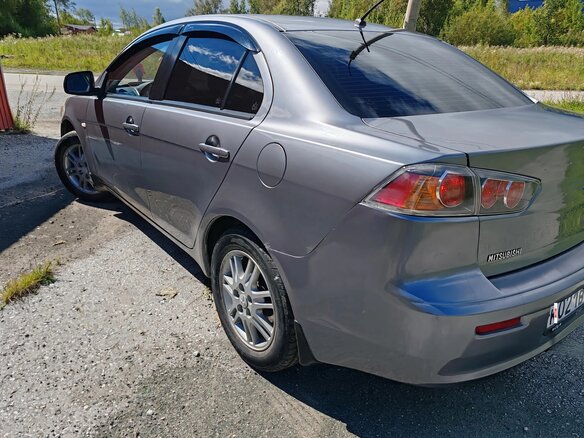 2012 Mitsubishi Lancer X Рестайлинг, серый - вид 4