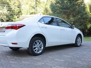 2014 Toyota Corolla XI (E160, E170, E180), белый, 1350000 рублей, вид 5