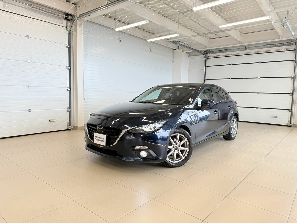 Открыть фотографии: Mazda Axela III
