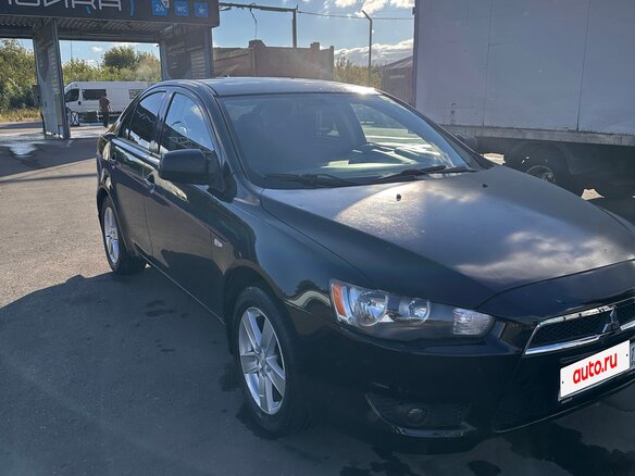2008 Mitsubishi Lancer X, чёрный, 450000 рублей - вид 1