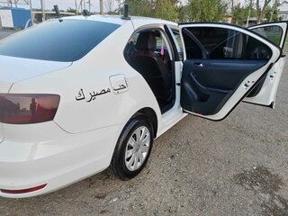 2015 Volkswagen Jetta VI Рестайлинг, белый, 1050000 рублей, вид 3