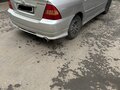 2004 Toyota Corolla IX (E120, E130), серебристый - вид 4