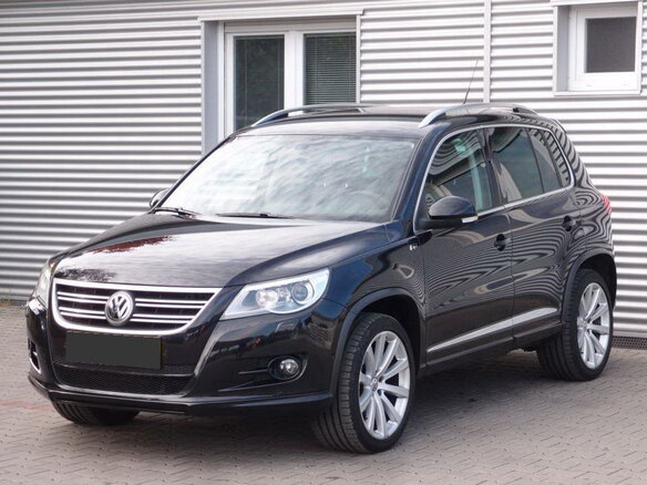 2011 Volkswagen Tiguan I, чёрный - вид 1