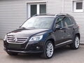 2011 Volkswagen Tiguan I, чёрный - вид 1