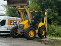 2007 Komatsu WB97S-5, жёлтый, 4100000 рублей - вид 1
