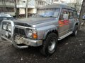 1990 Nissan Safari IV (Y60), серый - вид 1
