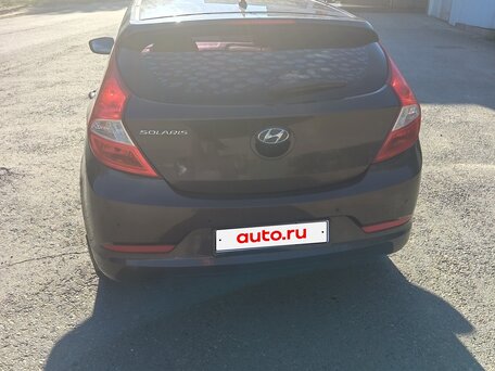 2016 Hyundai Solaris I Рестайлинг, коричневый, 1070000 рублей, вид 3