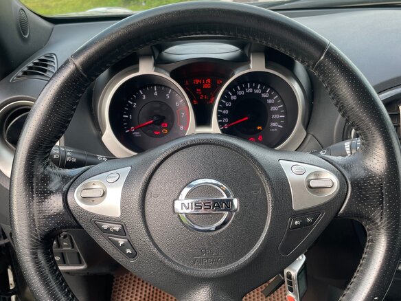 2011 Nissan Juke I, коричневый - вид 8