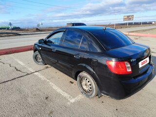 2011 Kia Rio II Рестайлинг, чёрный, 630000 рублей, вид 4