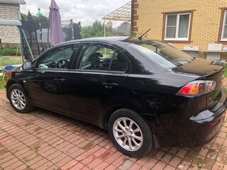 2010 Mitsubishi Lancer X, чёрный, 800000 рублей, вид 3