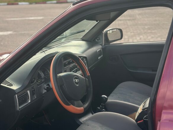 2011 Daewoo Nexia I Рестайлинг, пурпурный - вид 1