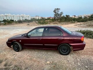 2001 Kia Shuma II, красный, 320000 рублей, вид 5