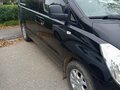 2011 Hyundai Grand Starex, чёрный, 1350000 рублей - вид 1