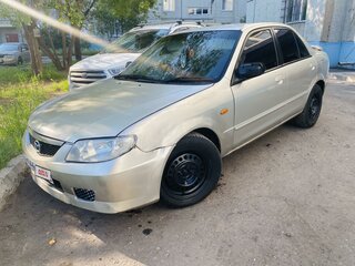 2002 Mazda 323 VI (BJ) Рестайлинг, золотистый, 280000 рублей, вид 2
