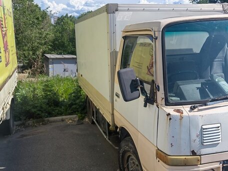 1991 Nissan Atlas, жёлтый, 650000 рублей, вид 4