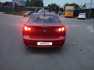 2007 Mitsubishi Lancer X, красный, 595000 рублей, вид 4