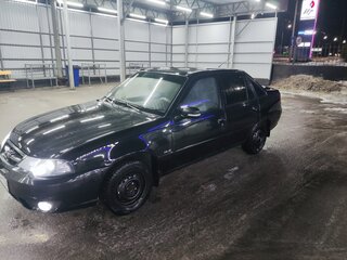 2012 Daewoo Nexia I Рестайлинг, чёрный, 230000 рублей, вид 1