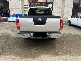 2008 Nissan Navara (Frontier) III (D40), серебристый, 1100000 рублей, вид 3
