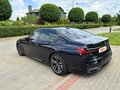 2020 BMW 7 серии 730d xDrive VI (G11/G12) Рестайлинг, чёрный - вид 1