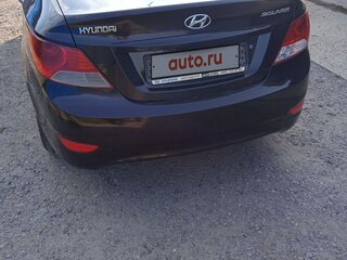 2013 Hyundai Solaris I, чёрный, 850000 рублей, вид 3