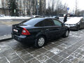 2009 Ford Focus II Рестайлинг, чёрный - вид 2