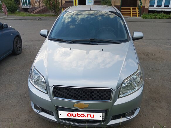 2011 Chevrolet Aveo I Рестайлинг, серебристый - вид 1