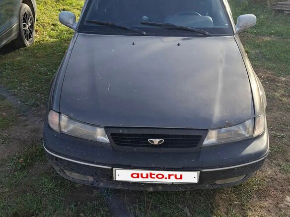 2001 Daewoo Nexia I, коричневый, 90000 рублей - вид 1