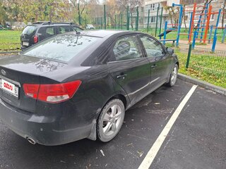 2011 Kia Cerato 6-speed II, чёрный, 530000 рублей, вид 5