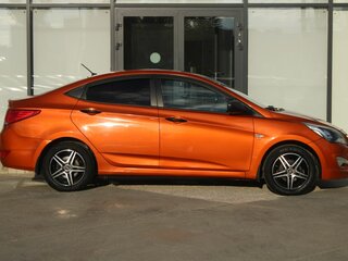 2014 Hyundai Solaris I, оранжевый, 1120000 рублей, вид 4