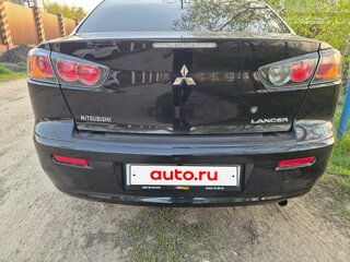 2011 Mitsubishi Lancer X Рестайлинг, чёрный, 740000 рублей, вид 5