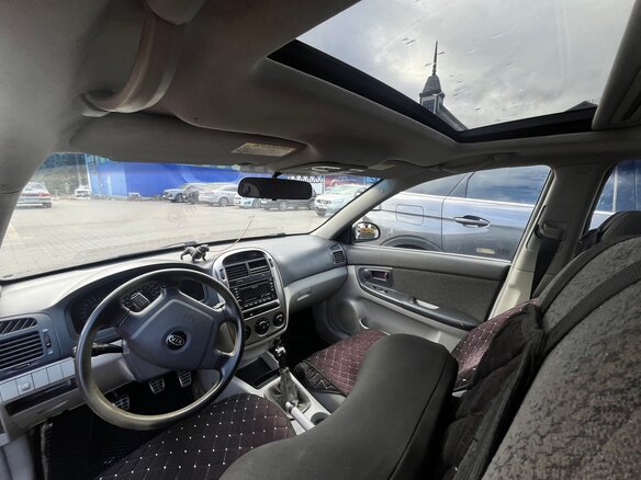 2004 Kia Spectra I Рестайлинг 2, чёрный, 200000 рублей - вид 5