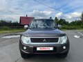 2011 Mitsubishi Pajero IV Рестайлинг 1, коричневый, 2000000 рублей - вид 3