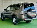 2010 Mitsubishi Pajero IV, коричневый, 1879000 рублей - вид 3
