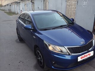 2013 Kia Rio 4-speed III, синий, 850000 рублей, вид 4