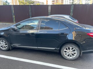 2013 Toyota Corolla XI (E160, E170, E180), чёрный, 1300000 рублей, вид 3