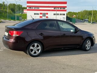 2010 Kia Cerato 6-speed II, красный, 630000 рублей, вид 4