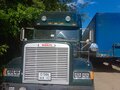 1999 Freightliner FLD, зелёный, 1500000 рублей - вид 1