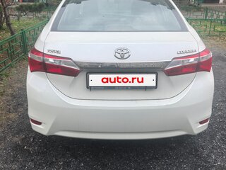2013 Toyota Corolla XI (E160, E170, E180), белый, 950000 рублей, вид 3