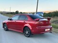2007 Mitsubishi Lancer X, красный - вид 2