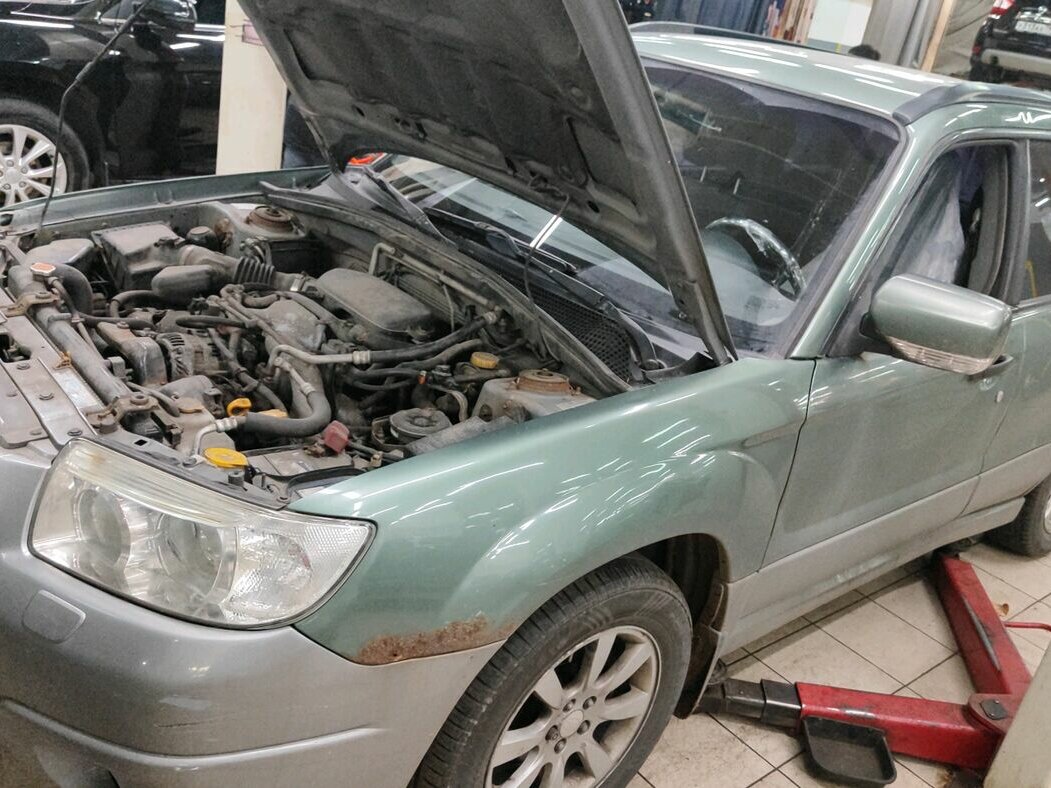 Открыть фотографии: Subaru Forester II Рестайлинг