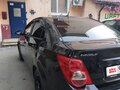 2012 Chevrolet Aveo II, чёрный, 540000 рублей - вид 4