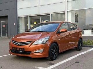 2014 Hyundai Solaris I Рестайлинг, оранжевый, 780000 рублей, вид 3