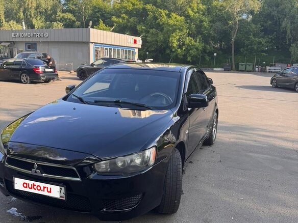 2007 Mitsubishi Lancer X, чёрный, 480000 рублей - вид 1