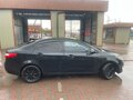 2012 Kia Rio 5-speed III, чёрный, 710000 рублей - вид 2